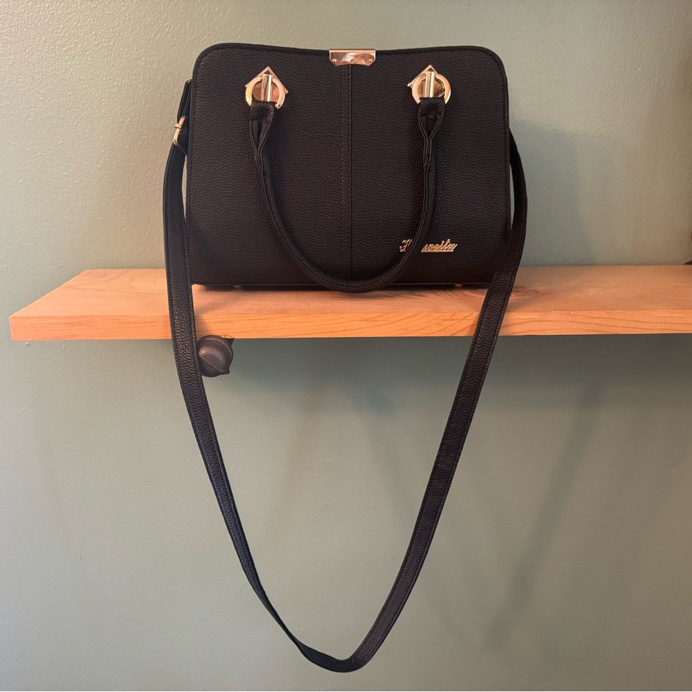 Black and Gold Crossbody Bag with Structured Design